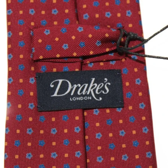 Drake's NWT Neck Tie in Red w/ Blue & Yellow Floral / Square Pattern 100% Silk